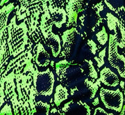 Neon green and black mesh snake print shorts texture