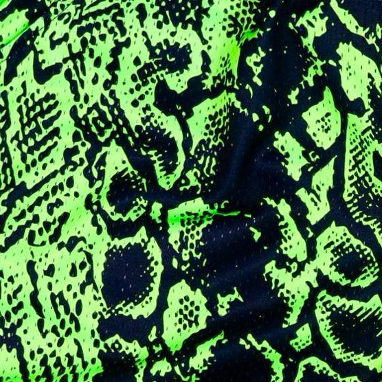 Neon green and black mesh snake print shorts texture