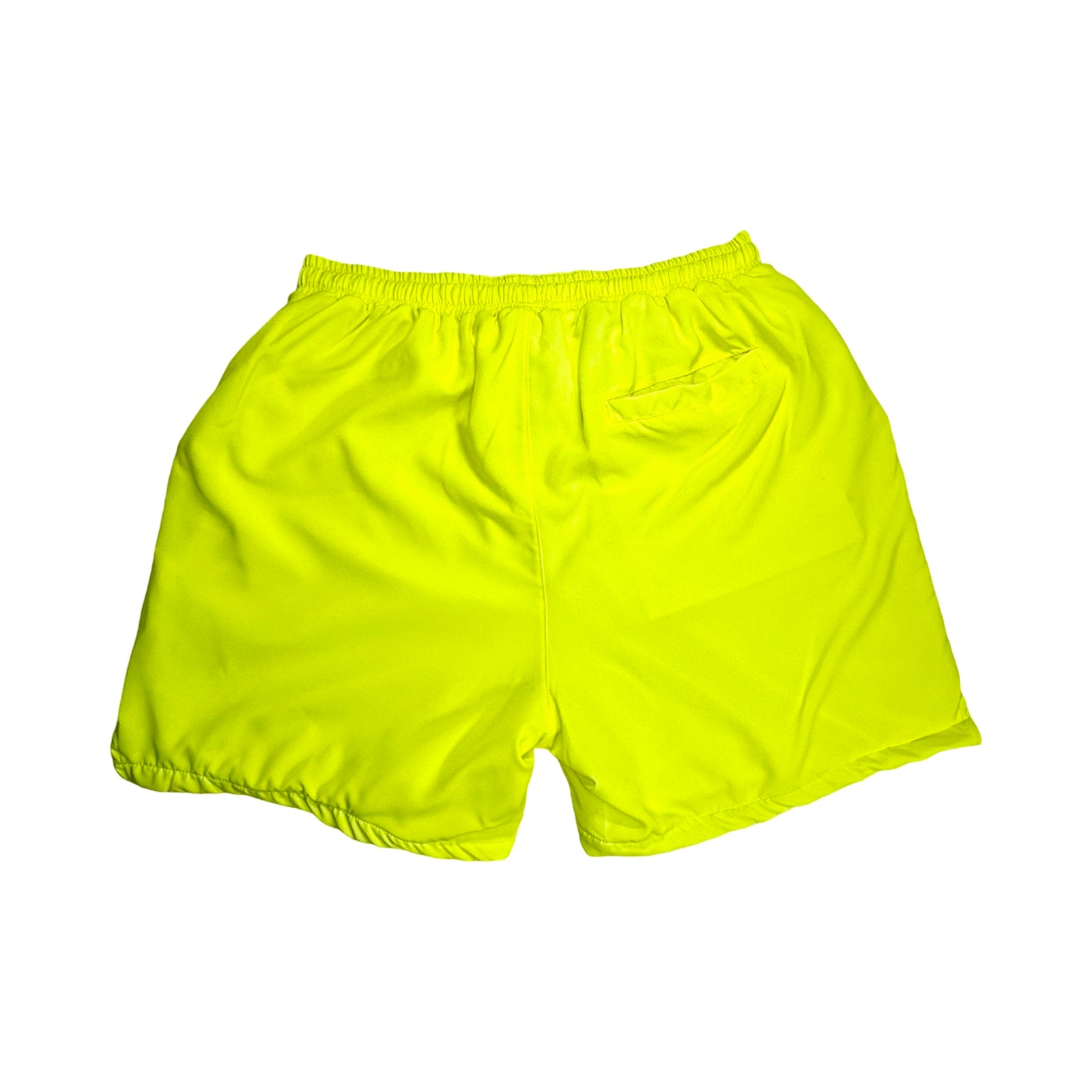 Bright neon yellow shorts on a white background