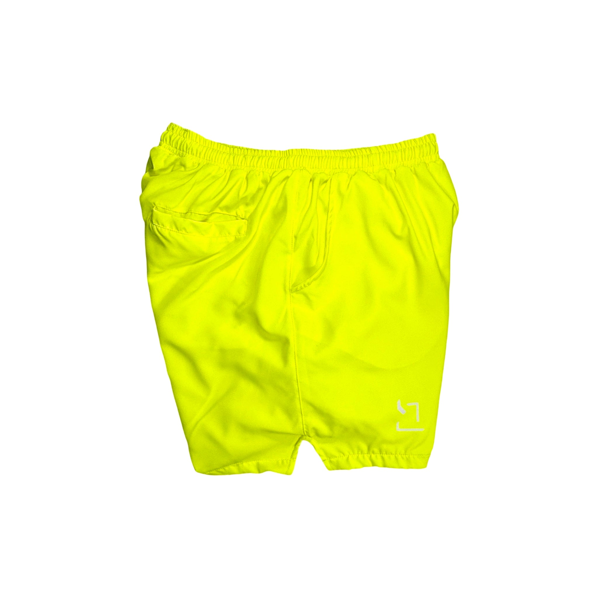 Bright neon yellow shorts on a white background