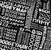Pattern of 'Boogeyman' text on a black background fabric closeup