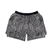 Black and white elephant print pattern soft dry fit shorts on a white background