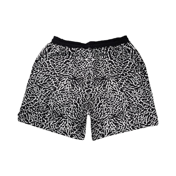 Back view of Black and white elephant print pattern soft dry fit shorts on a white background