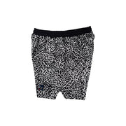 Side view of Black and white elephant print pattern soft dry fit shorts on a white background