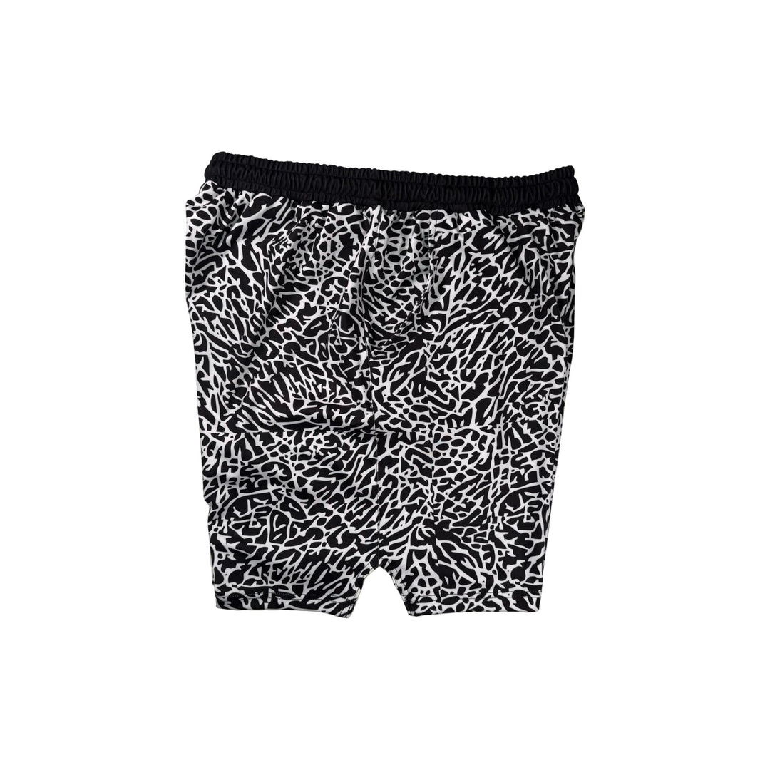 Other side view of Black and white elephant print pattern soft dry fit shorts on a white background