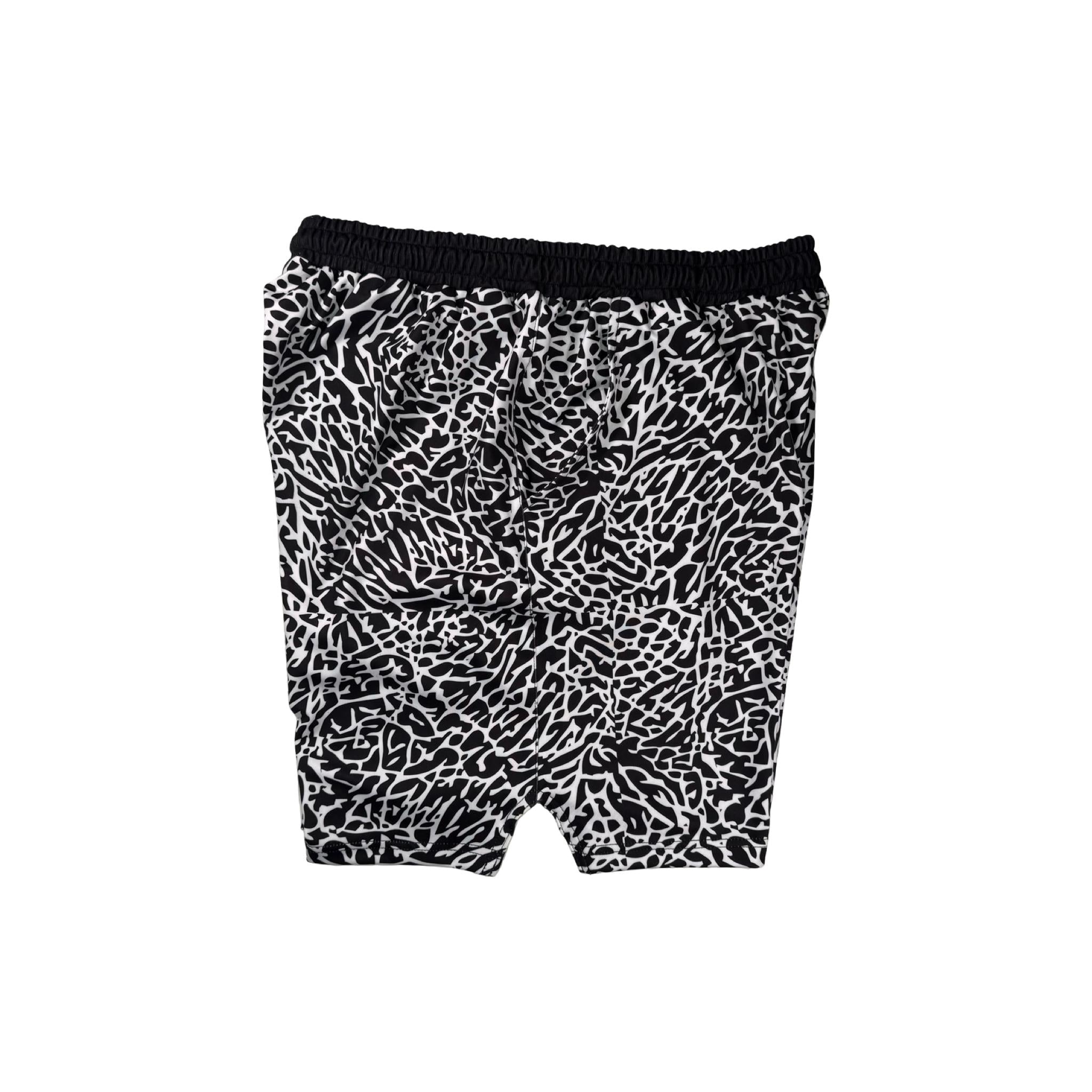 Other side view of Black and white elephant print pattern soft dry fit shorts on a white background