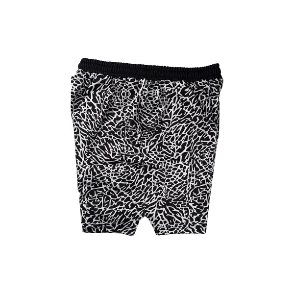 Other side view of Black and white elephant print pattern soft dry fit shorts on a white background