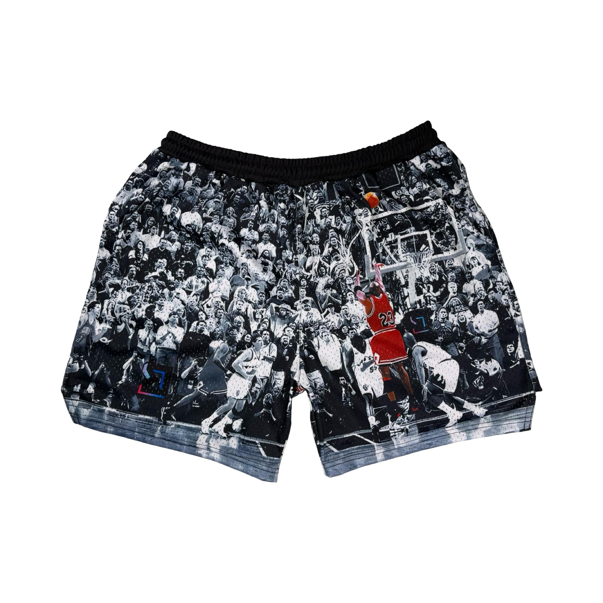 Shorts with a black and white vintage game winner photo design featuring a basketball player in action on a white background.