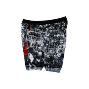 Shorts with a black and white vintage game winner photo design featuring a basketball player in action on a white background.