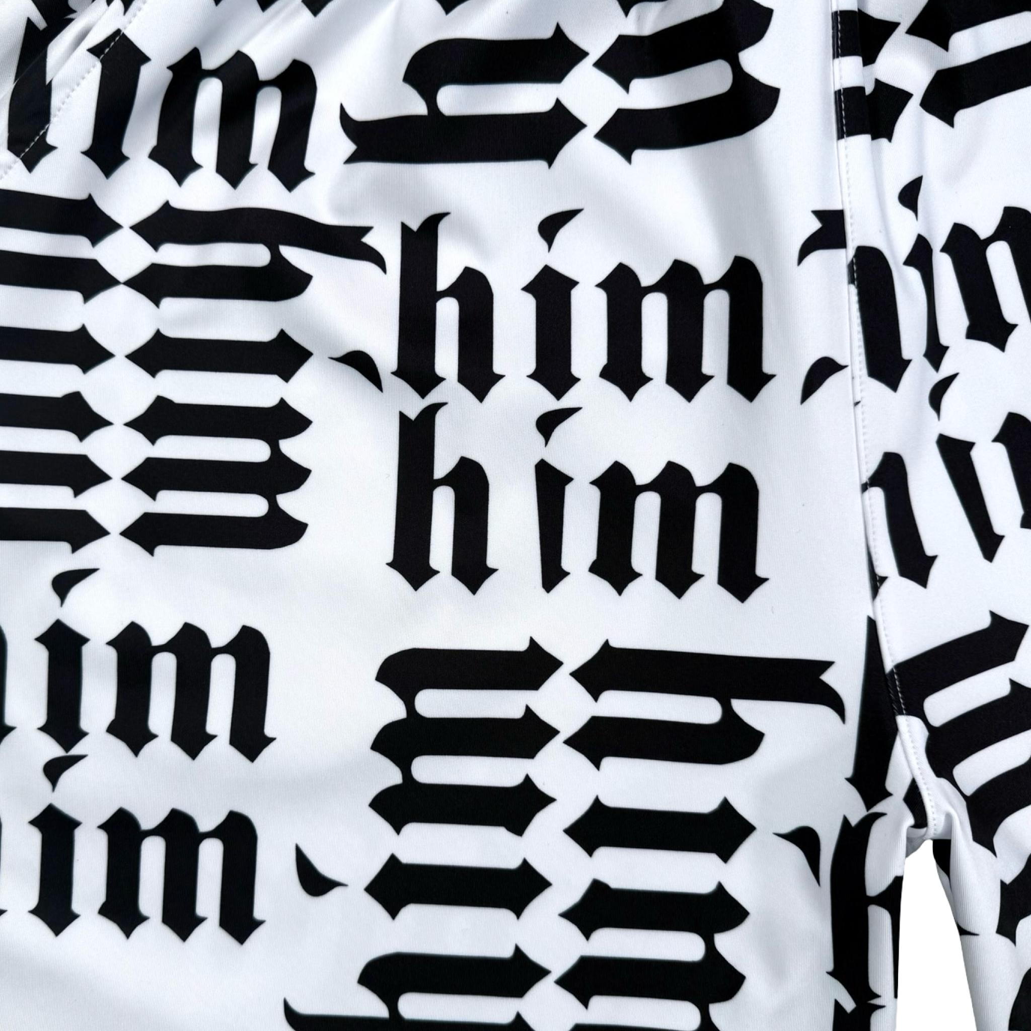 Closeup of Pattern of the word 'him' repeated in black and fabric on a white background