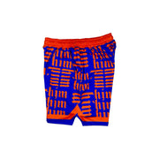 Side view of Purple soft dry fit shorts with repeating orange him text pattern on a white background