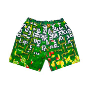 Green shorts with fruit candy box mosaic style pattern