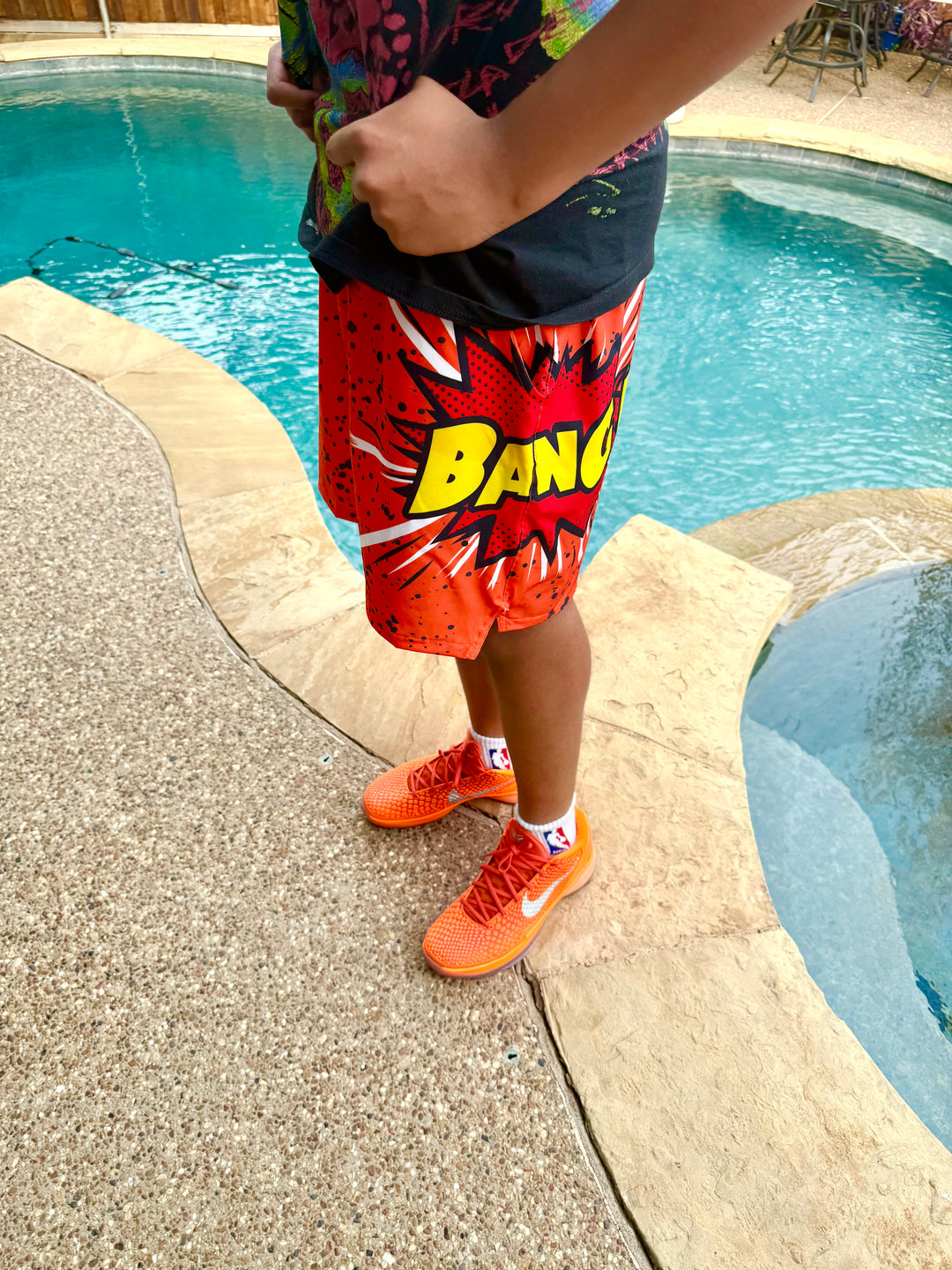 BANGer GO | ORANGE GLOW Water Repellent 4-Way Stretch Shorts