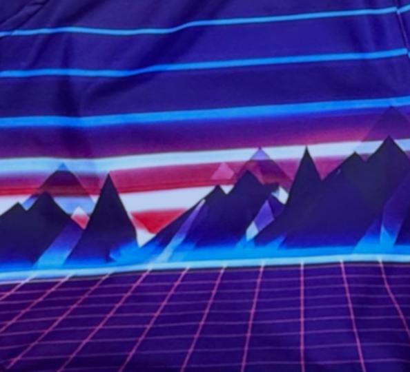 Purple fast drying shorts with retro synth wave mountain and grid design closeup texture
