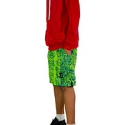 Person wearing a red hoodie and neon green snake patterned mesh shorts