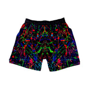 Colorful abstract patterned shorts on a white background