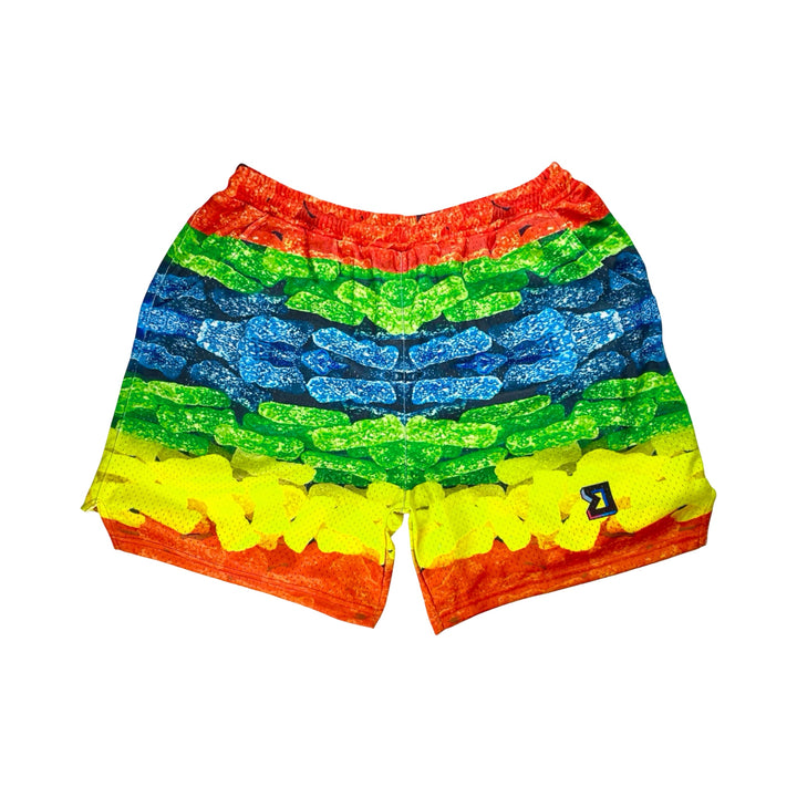 Colorful sour candy mesh patterned shorts on a white background