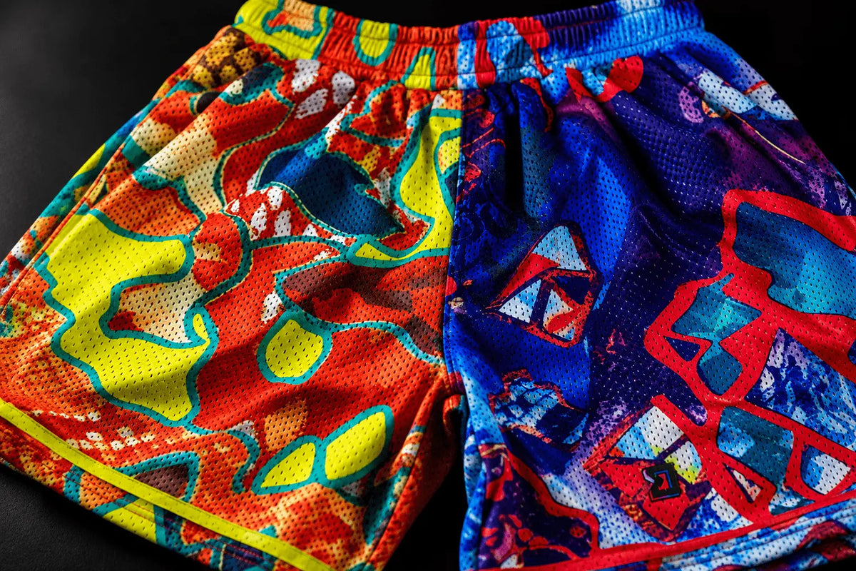 Detailed view of vibrant colors and graphic finishing on PLAYGROUND™ basketball shorts.