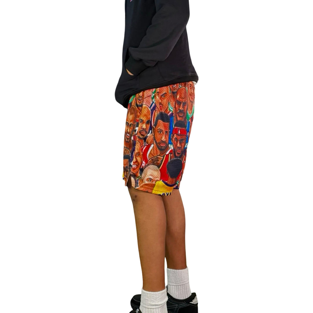 Person wearing shorts with a colorful graphic design on a white background