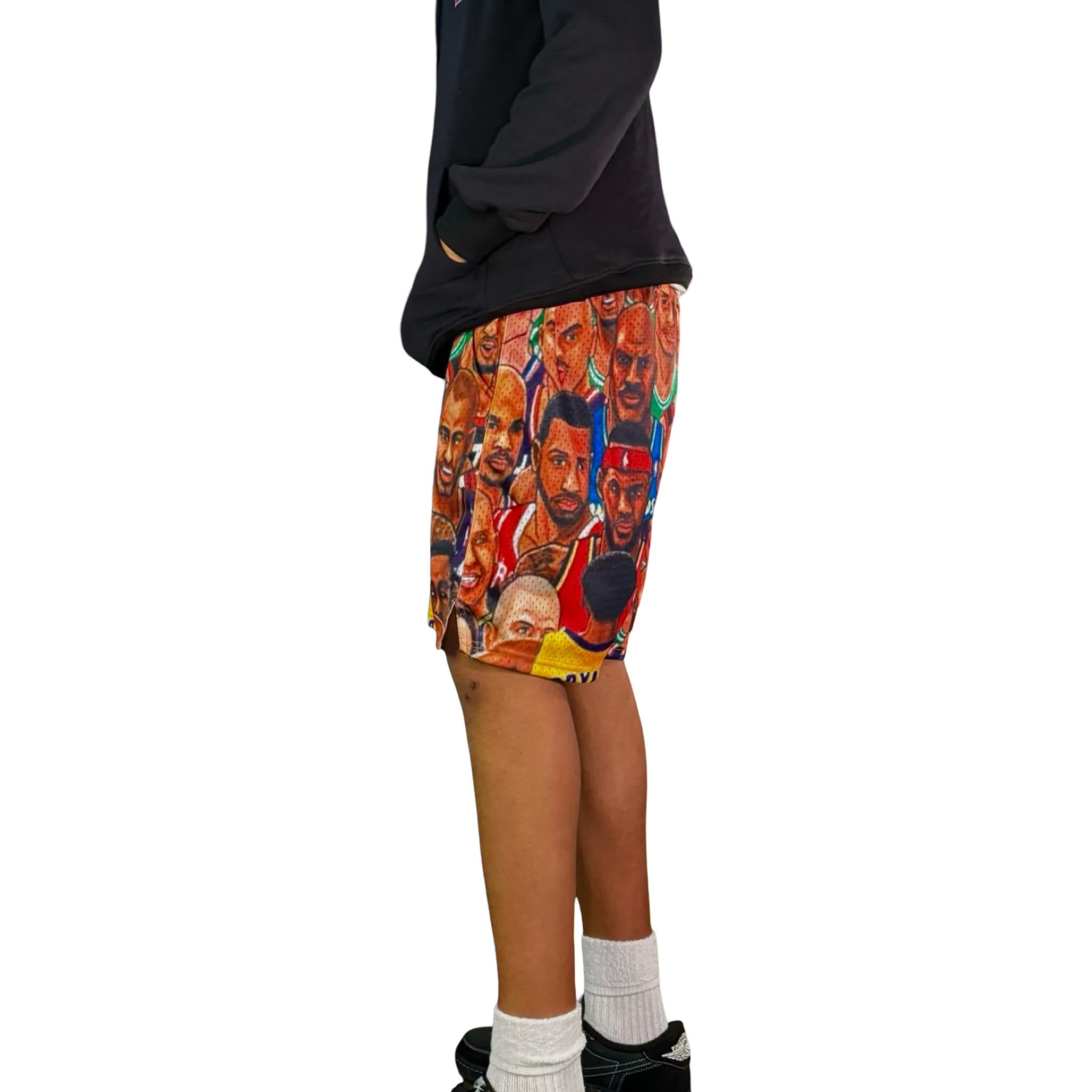 Person wearing shorts with a colorful graphic design on a white background