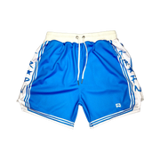Showtime Elite PRO™ Sky basketball shorts featuring a vibrant sky blue MeshX™ body, white oversized PRO waistband, premium athletic fit, and classic basketball styling designed to match University Blue and Nike basketball sneakers.