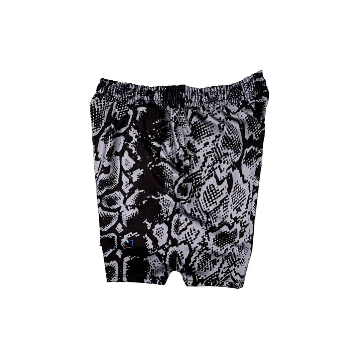 Side view of Black soft dry fit basketball shorts with silver snakeskin pattern on white background.