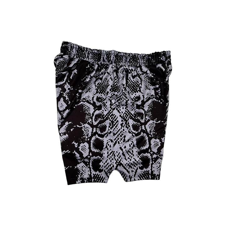 Other side view of Black soft dry fit basketball shorts with silver snakeskin pattern on white background.