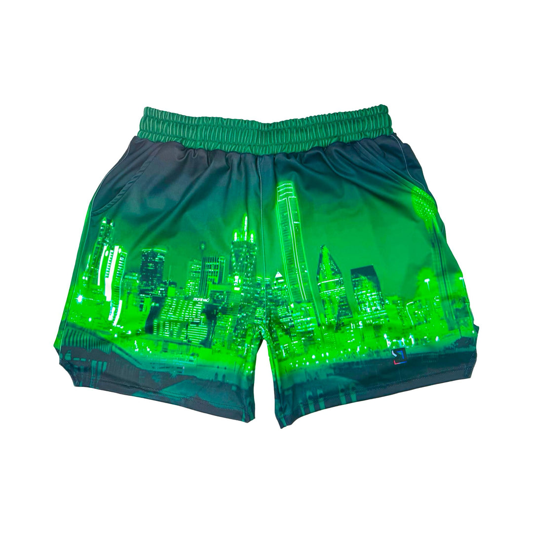 Skyline green dry fit shorts with skyline graphic on white background.