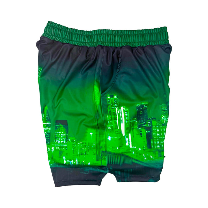 Other side view of Skyline green dry fit shorts with skyline graphic on white background.