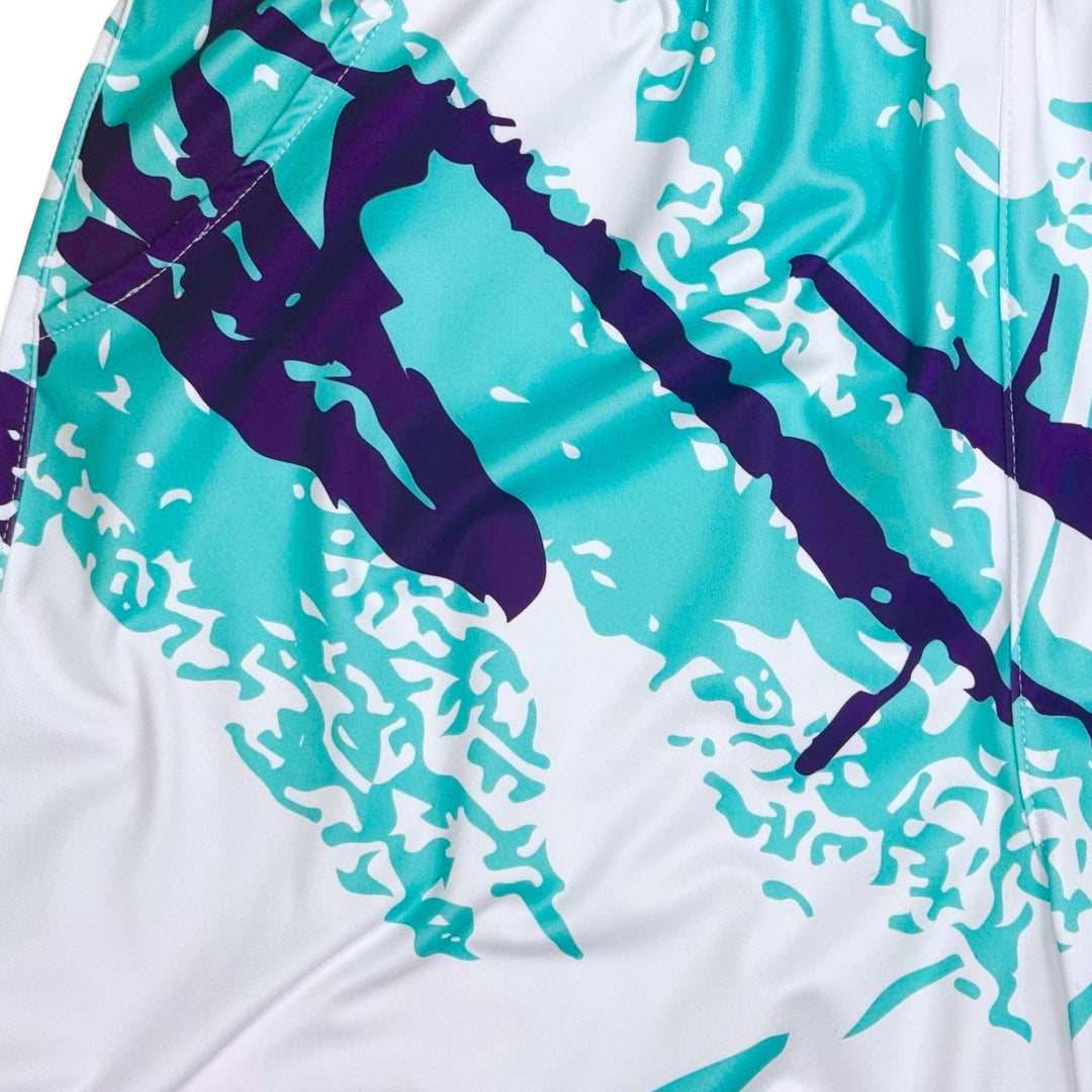 closeup view of texture of white solo cup art splash soft dry fit basketball shorts on a white background