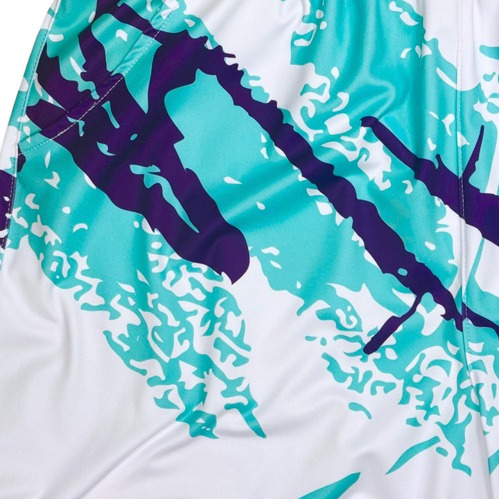 closeup view of texture of white solo cup art splash soft dry fit basketball shorts on a white background