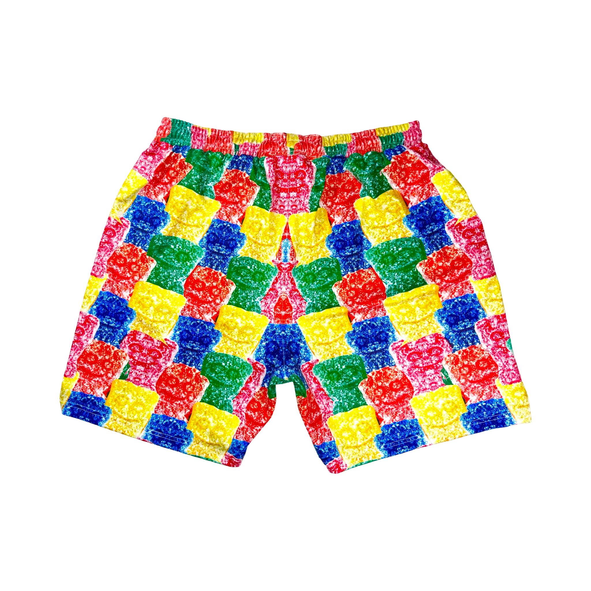 rear view of Multicolored soft dry fit basketball shorts with repeating Sour Candy graphic on a white background