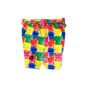 Side view of Multicolored soft dry fit basketball shorts with repeating Sour Candy graphic on a white background