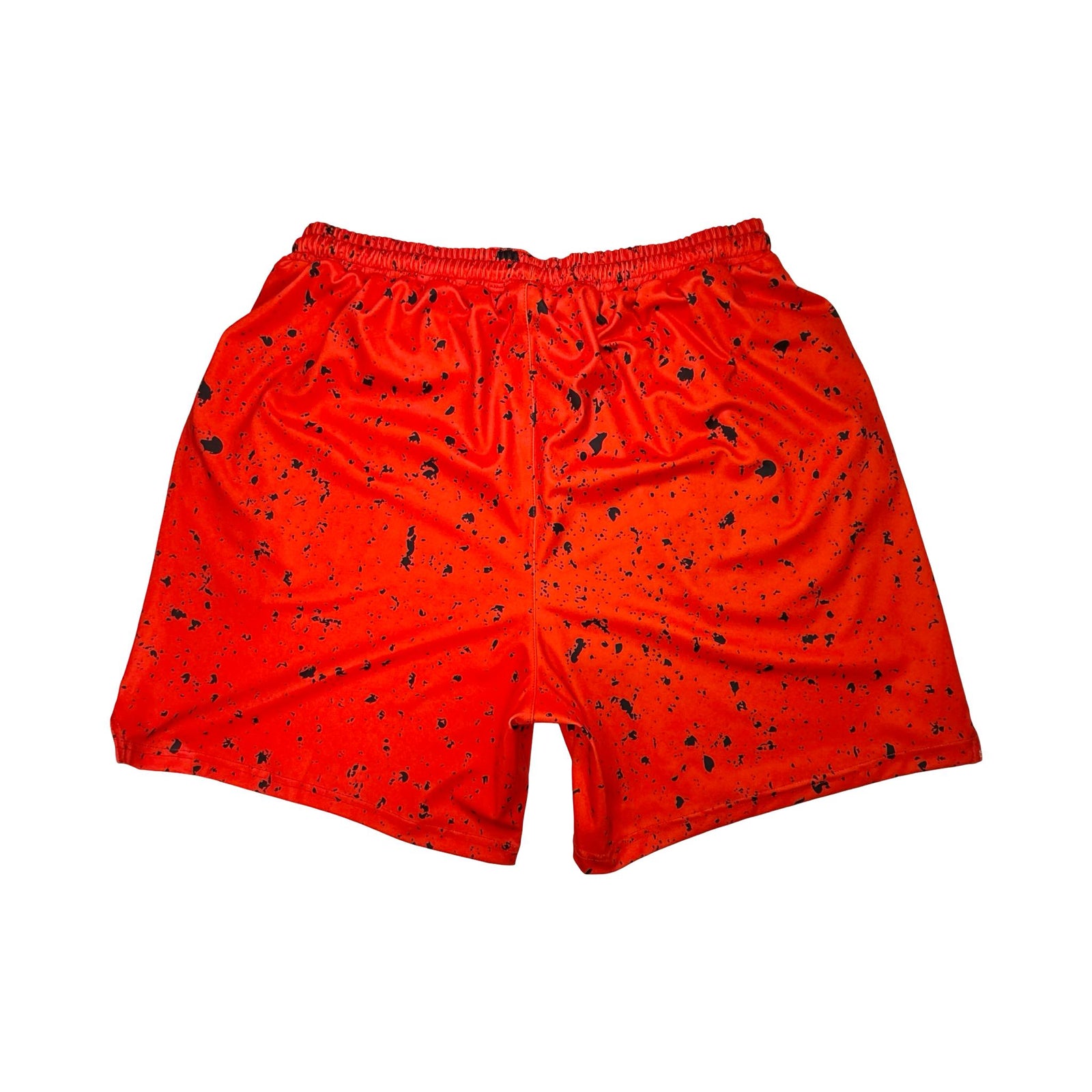 Back side view of Red soft dry fit basketball shorts with black speckle repeating pattern on a white background