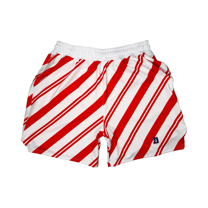White dry fit shorts with red Candy cane striped pattern on white background.
