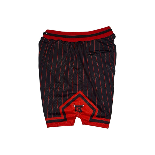 Black and red pinstriped athletic shorts with a red waistband and a red geometric patch on the front, shown flat on a white background.