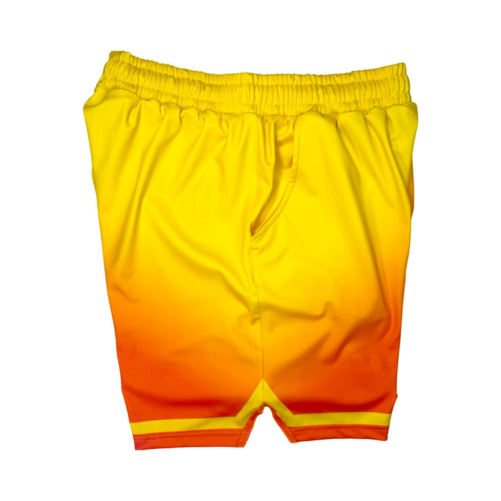 Other side view of Sunburst yellow to pink gradient dry fit shorts with yellow stripe on white background.