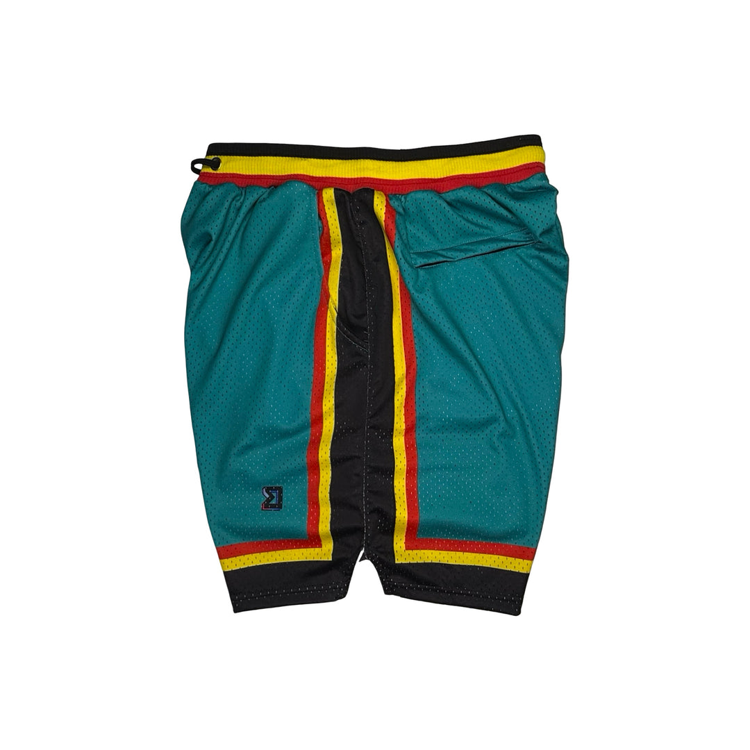 A pair of teal basketball shorts with black side panels and vertical red and yellow stripes, shown flat on a white background.