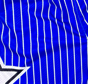 Closeup view of texture of Blue Pro style heavy duty white pinstripe mesh basketball shorts on a white background