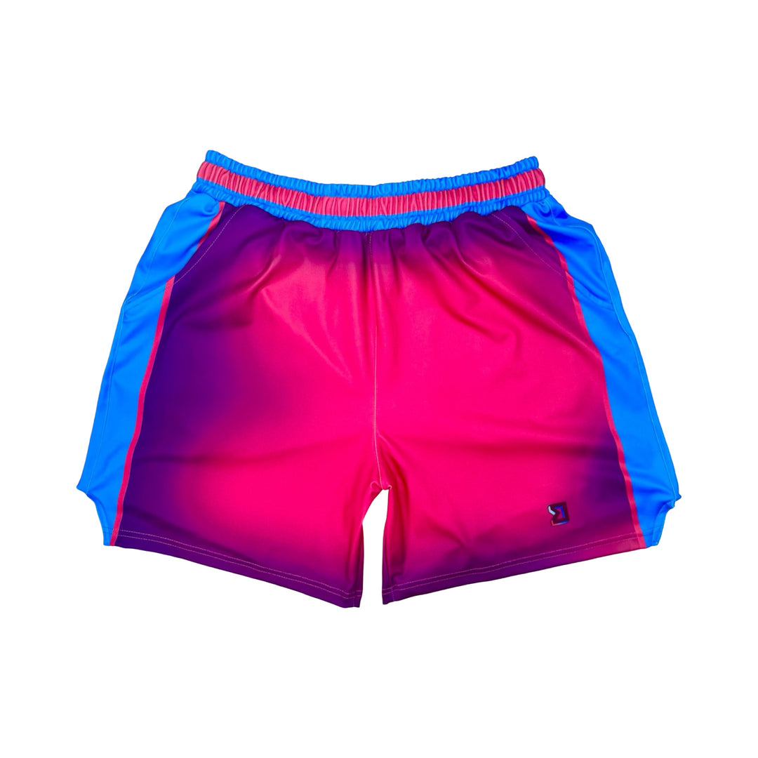 Pink and blue shorts on a white background
