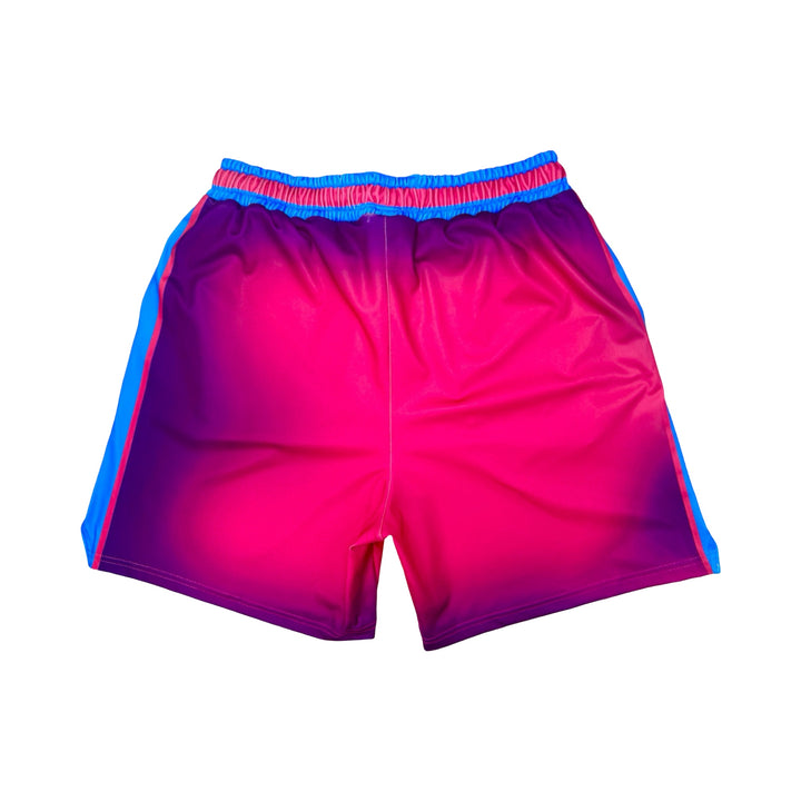 Pink and blue shorts on a white background