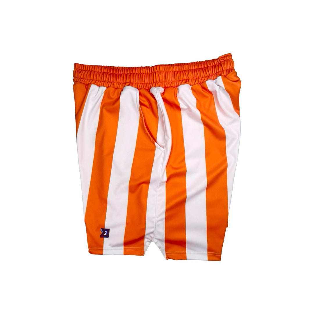 Orange and white striped shorts on a white background