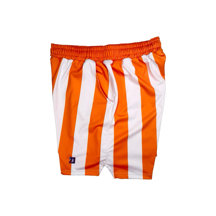 Orange and white striped shorts on a white background
