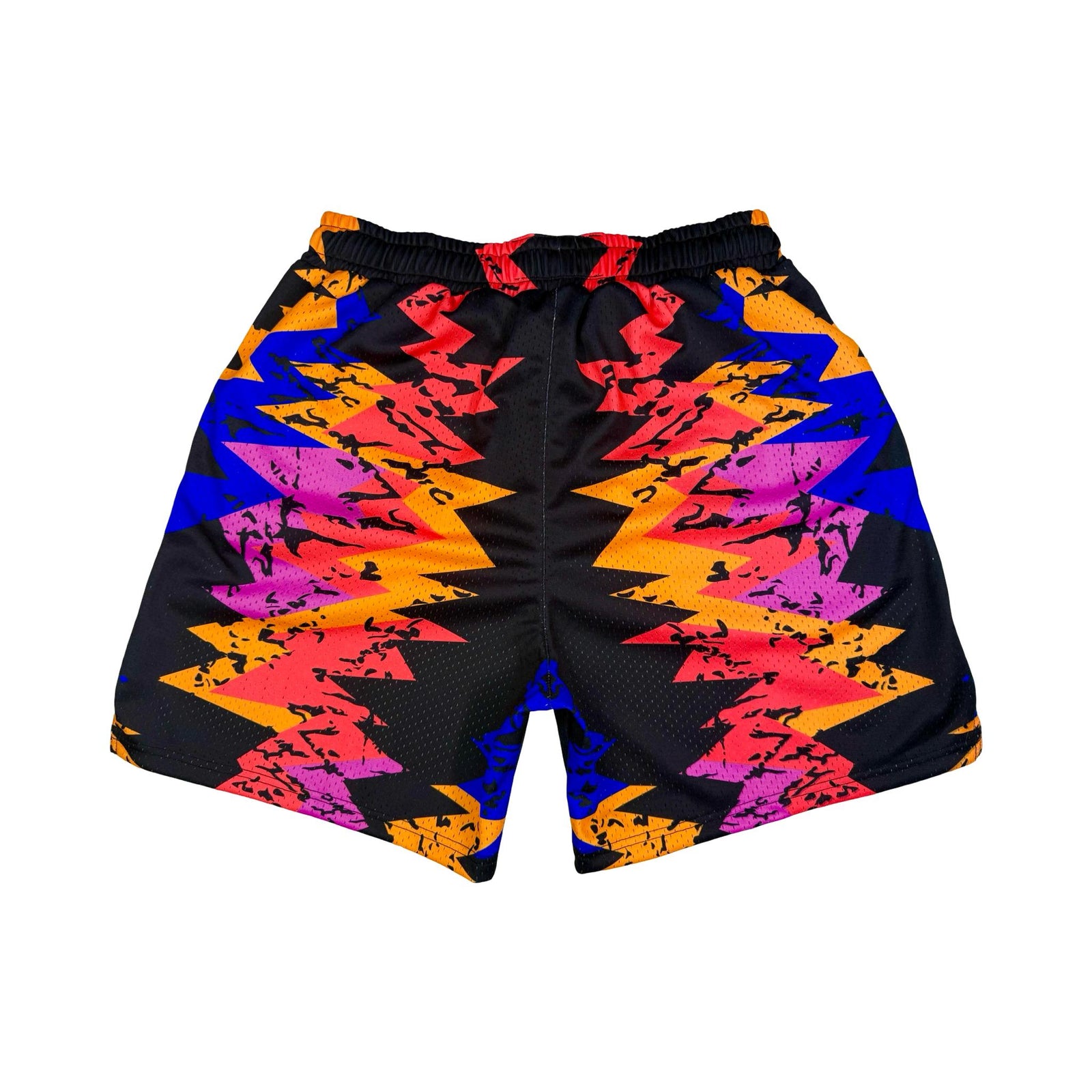 Colorful geometric patterned shorts on a white background