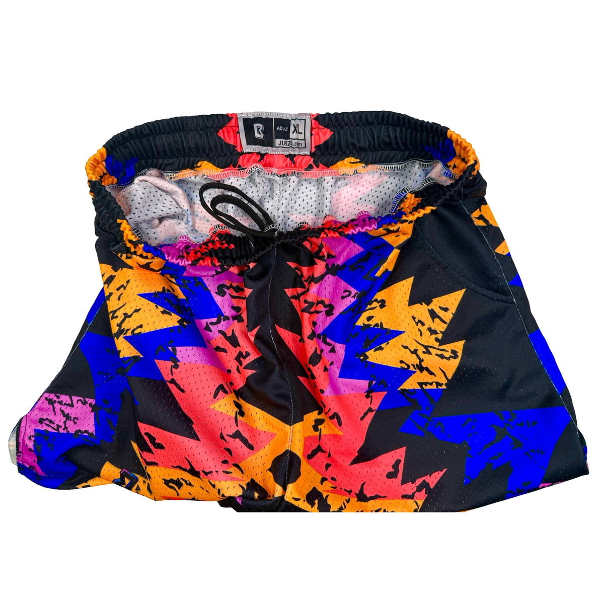 Colorful geometric-patterned dog hoodie on a white background