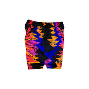 Colorful geometric patterned shorts on a white background