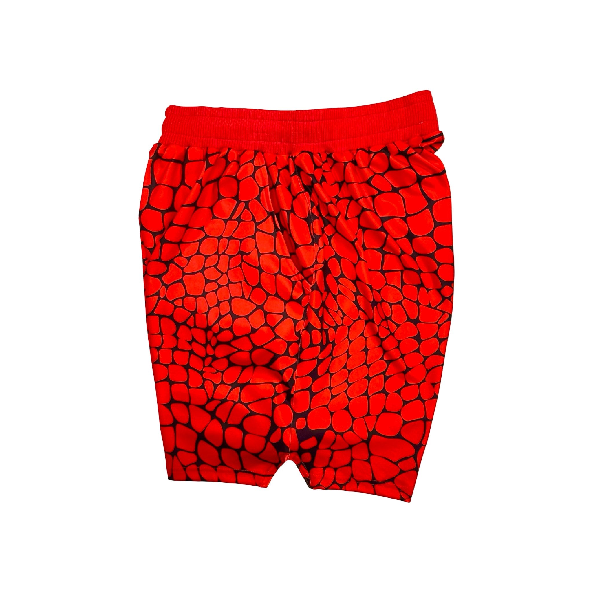 Red shorts with black gator/zombie pattern on a white background