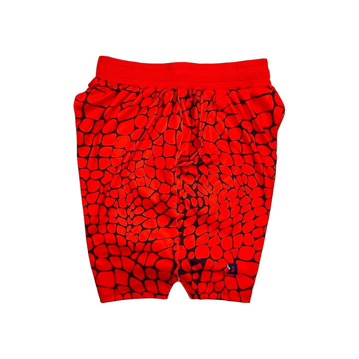 Red shorts with black gator/zombie pattern on a white background