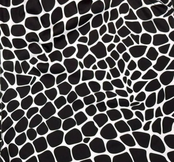 Black and white gator zombie patterned fabric texture