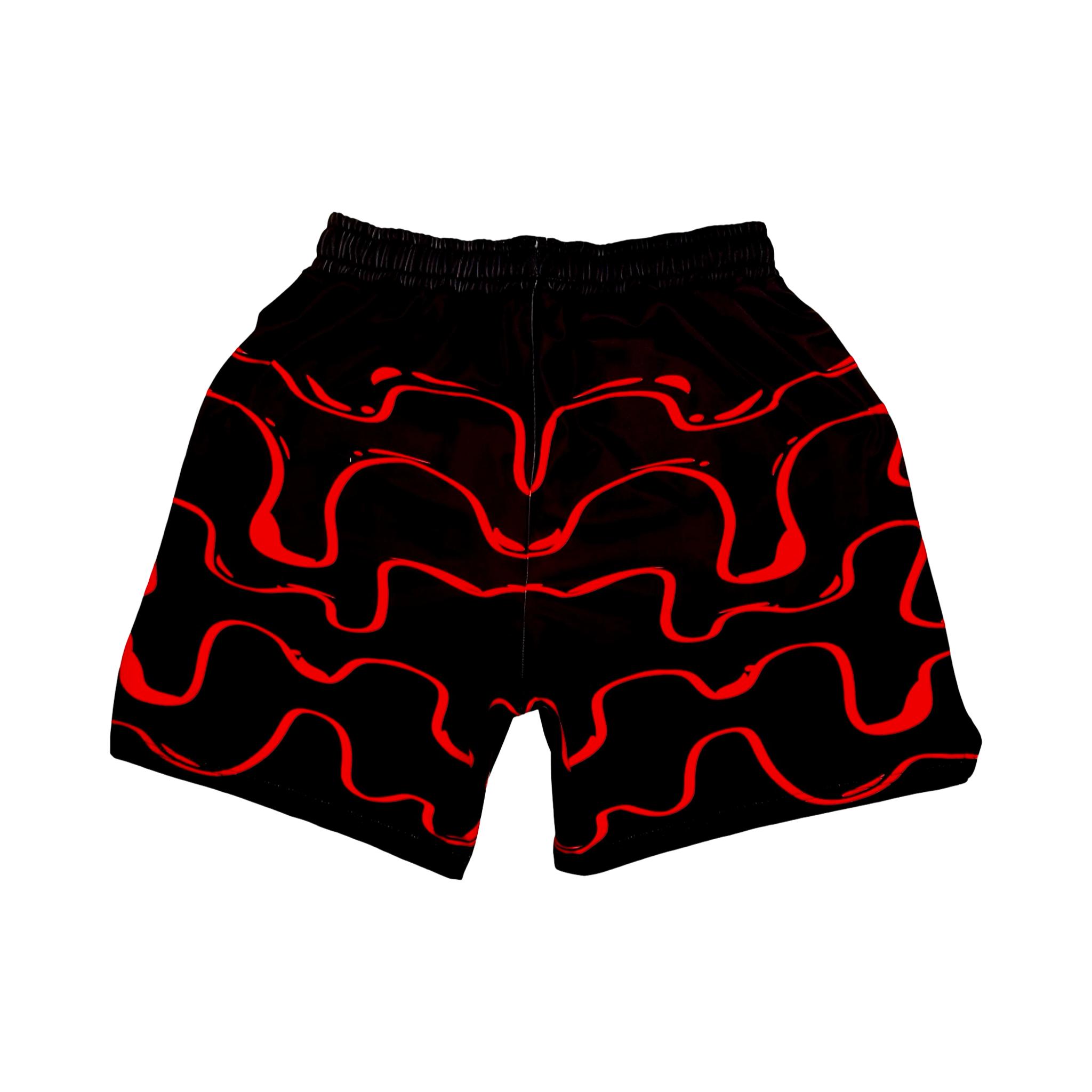Black shorts with red wavy drip patterns on a white background